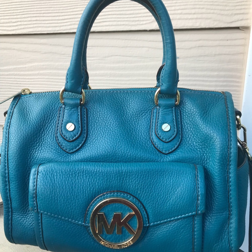 👜